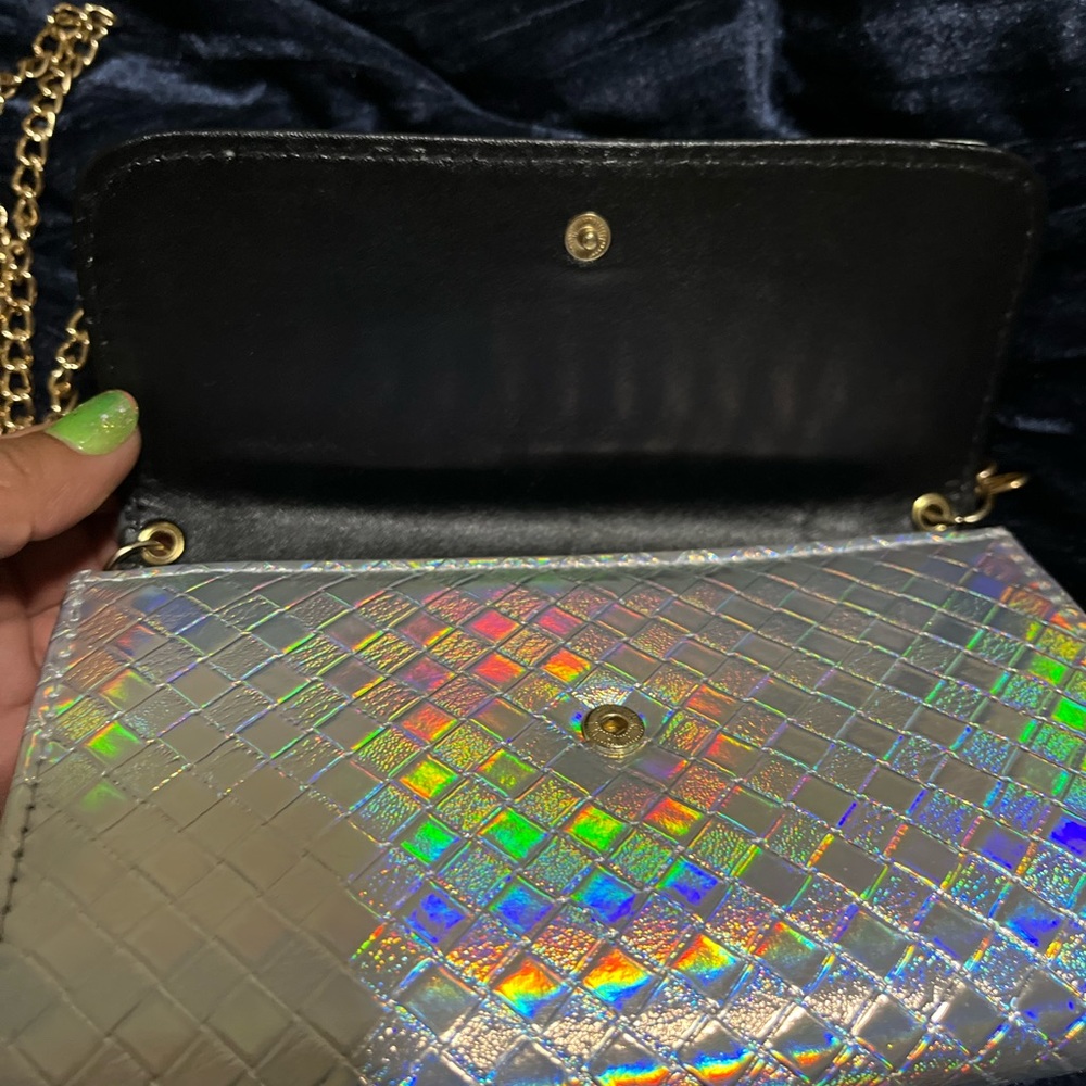 Rainbow holographic looking clutch wallet with chain is stylish and matches all